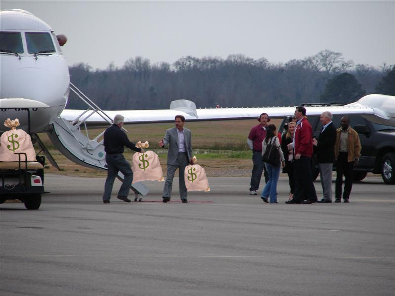 saban-arriving-at-airport.jpg